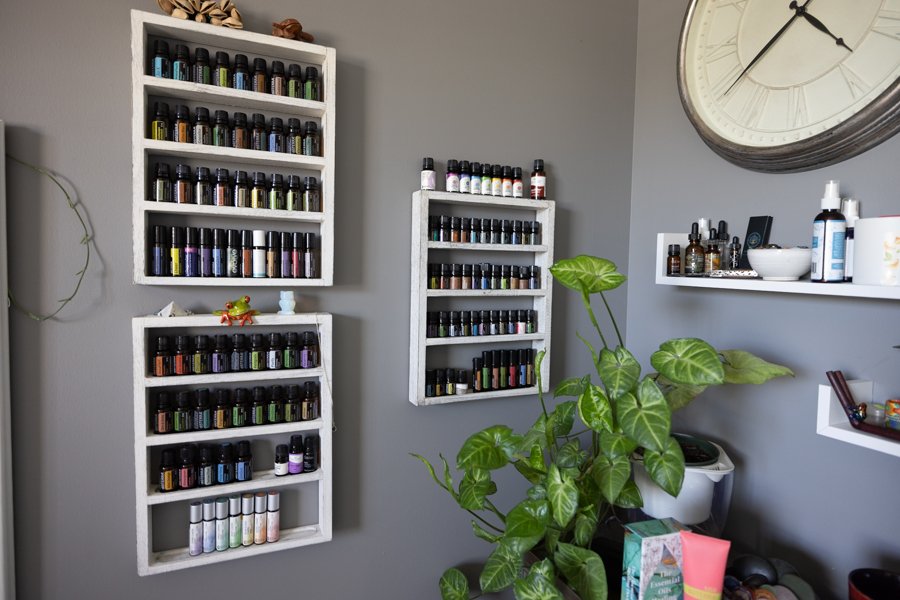 Massage oils and tools on a counter in a treatment studio at CGW Studios.