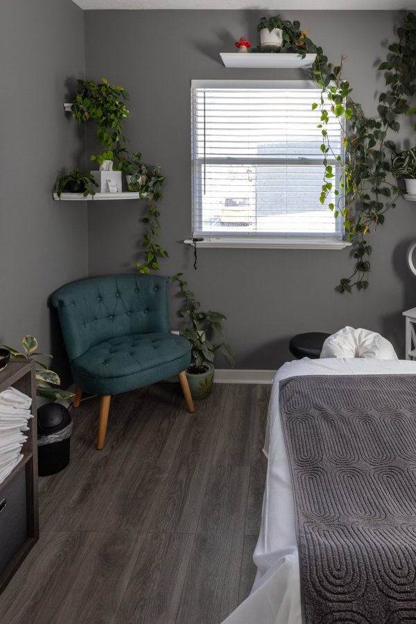 A private treatment studio at CGW Studios with a hydraulic table and soft natural light, set up for facial work.